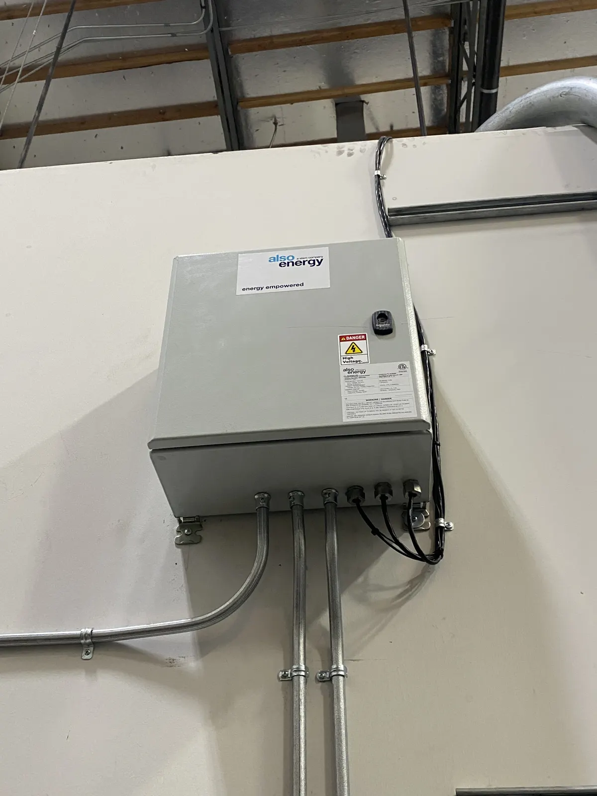 Equipment enclosure and conduit