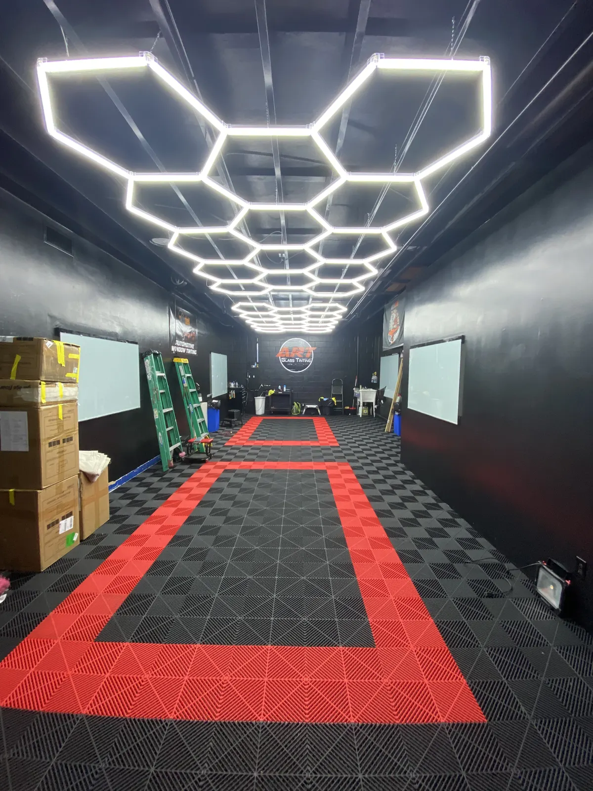 Hexagon LED lighting we installed in a detail garage